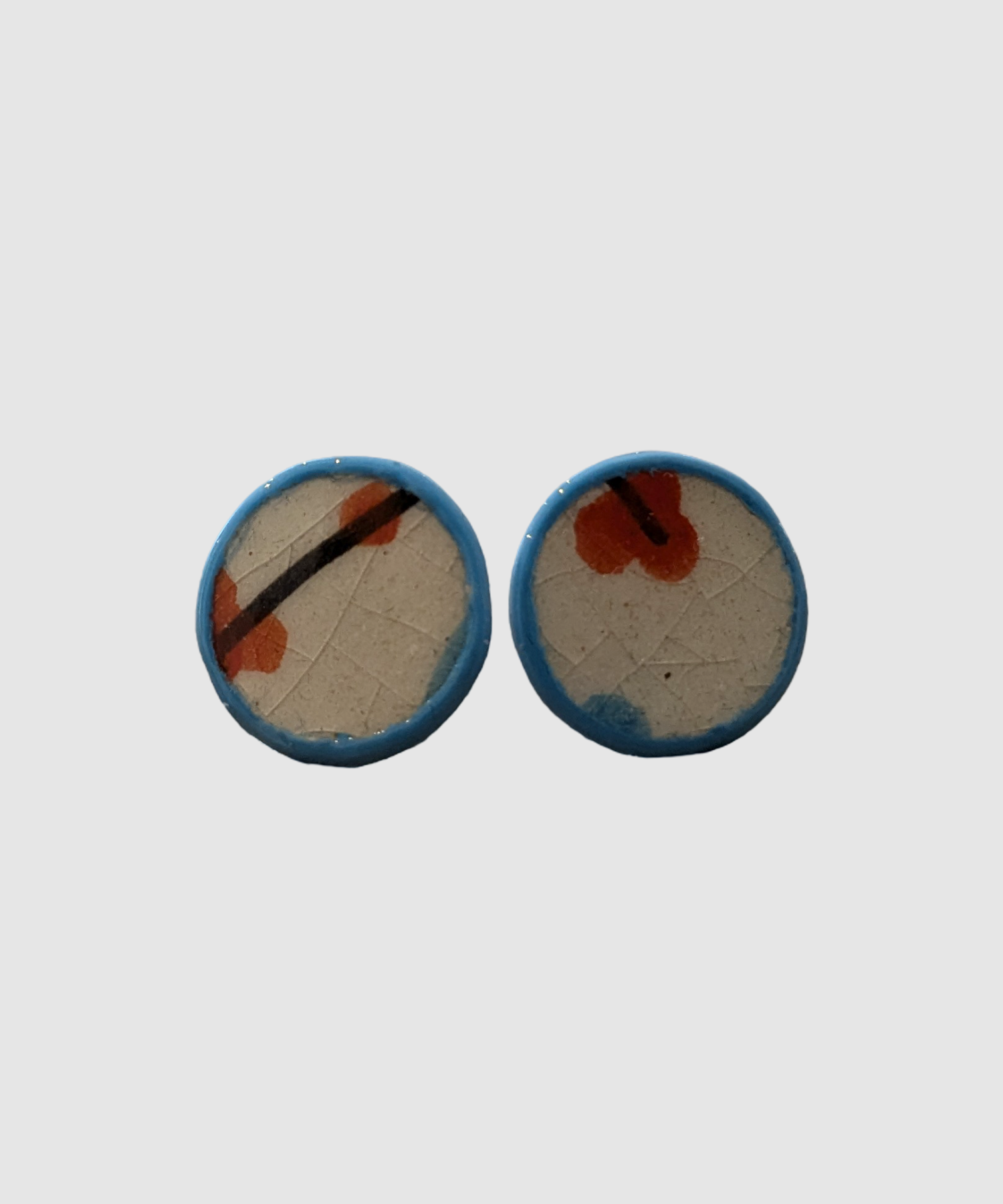 Handmade earrings made of Palestinian ceramics - Å